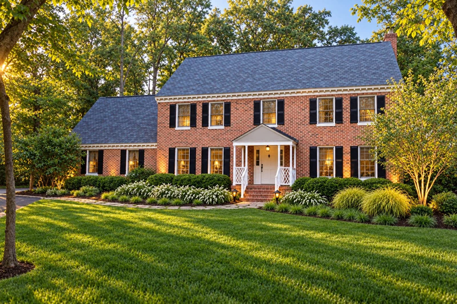 YardCast design: Brick colonial on a wooded lot